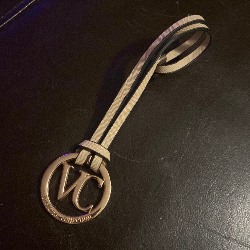 Victoria Collection bag charm in great condition